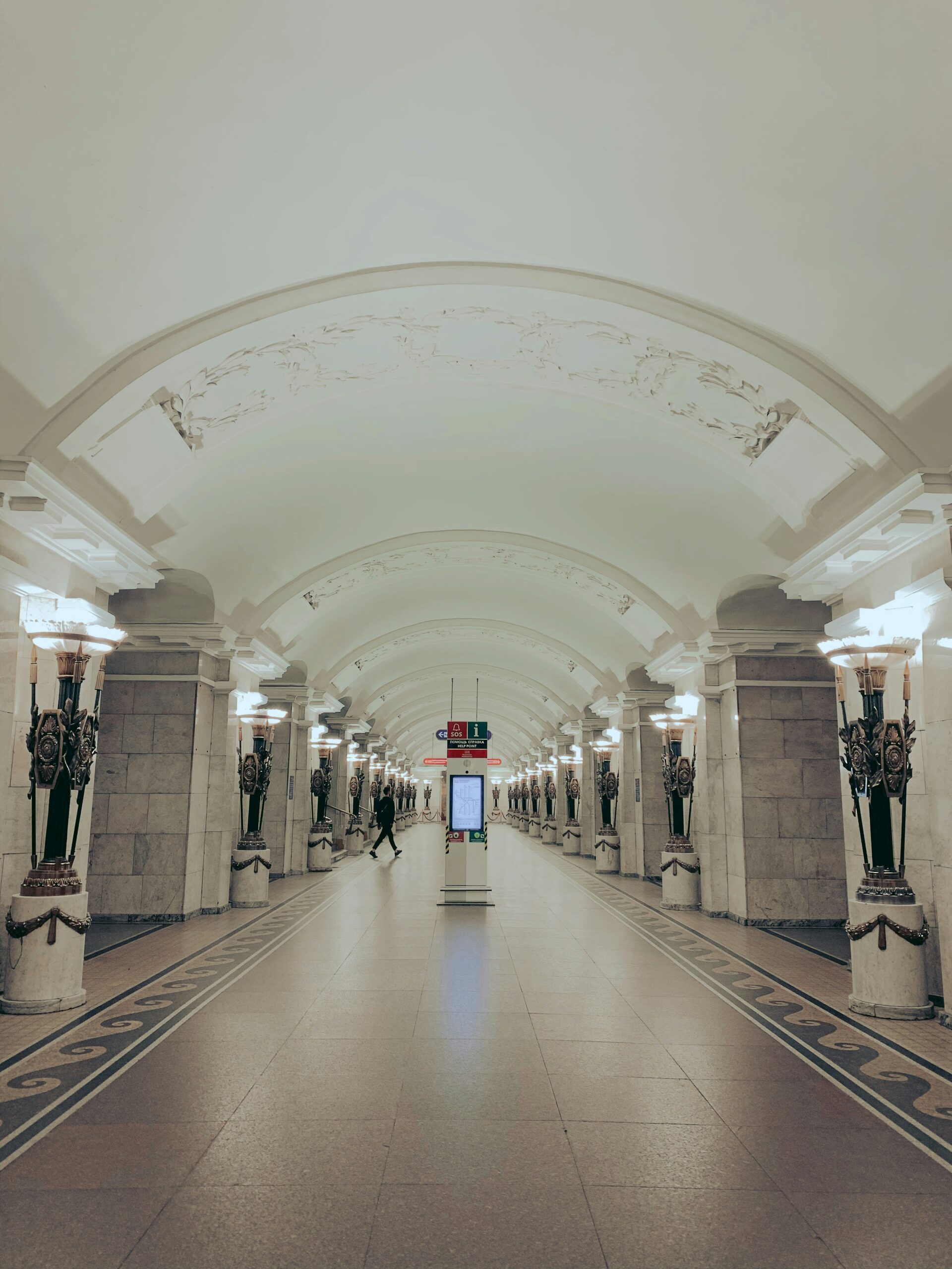 people walking on hallway during daytime
